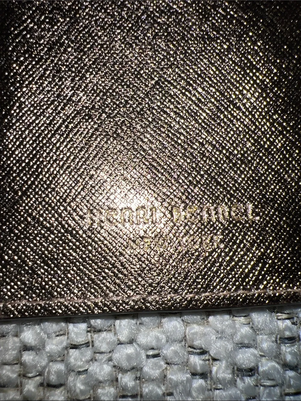 henri bendel metallic rose gold wallet with gold-tone plaque